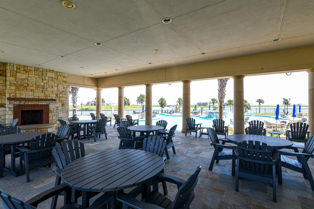 Common Area with an outdoor fireplace and BBQ grills