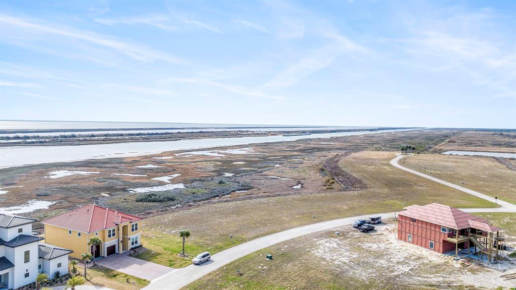 Aerial view of Lot 102 with the view of the ICW, Dewberry Island, and Espiritu Santo Bay