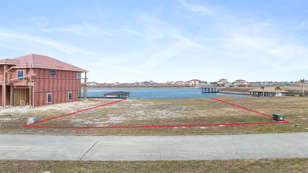 View of Lot 171 from Tuscany Way with approximate property lines looking towards the waterfront