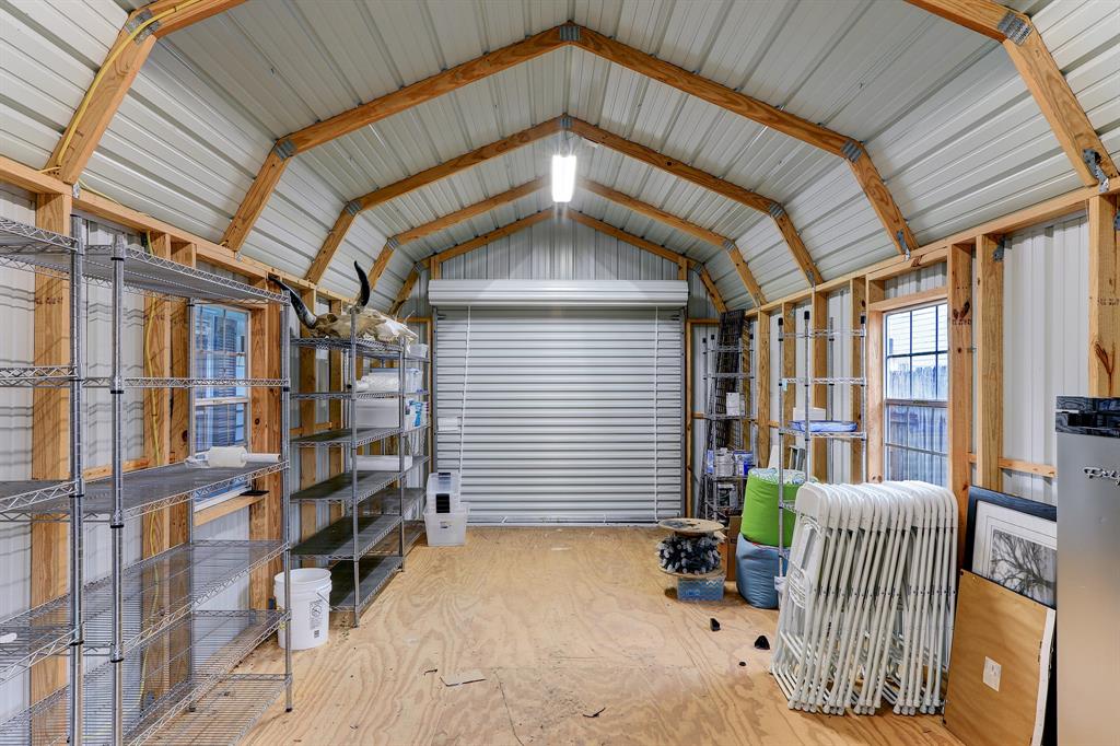 THE LARGE SHED IS A GREAT AREA FOR A WORKSHOP, EXTRA STORAGE, MOTORCYCLE OR GOLF CART GARAGE.