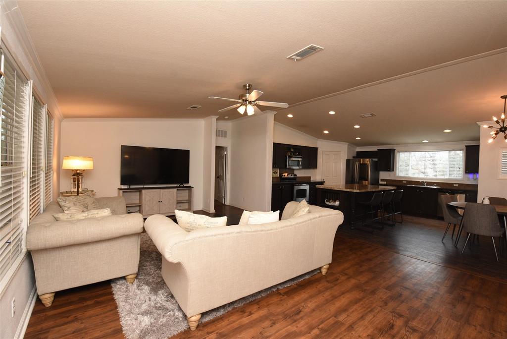 View from the front door into the living area, nice open floor plan.