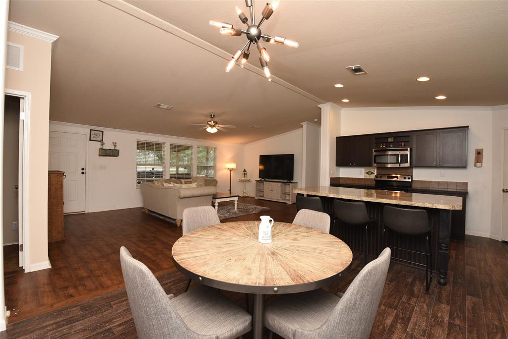 Breakfast area has additional seating right next to kitchen area.