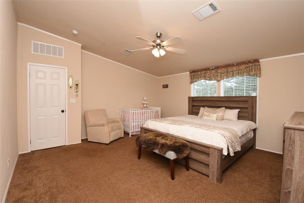 Oversized Master Bedroom with space for king size bed and sitting area.