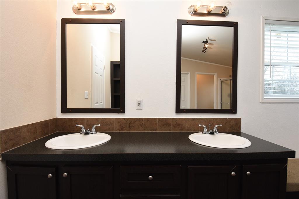 Dual vanities make getting ready a breeze.