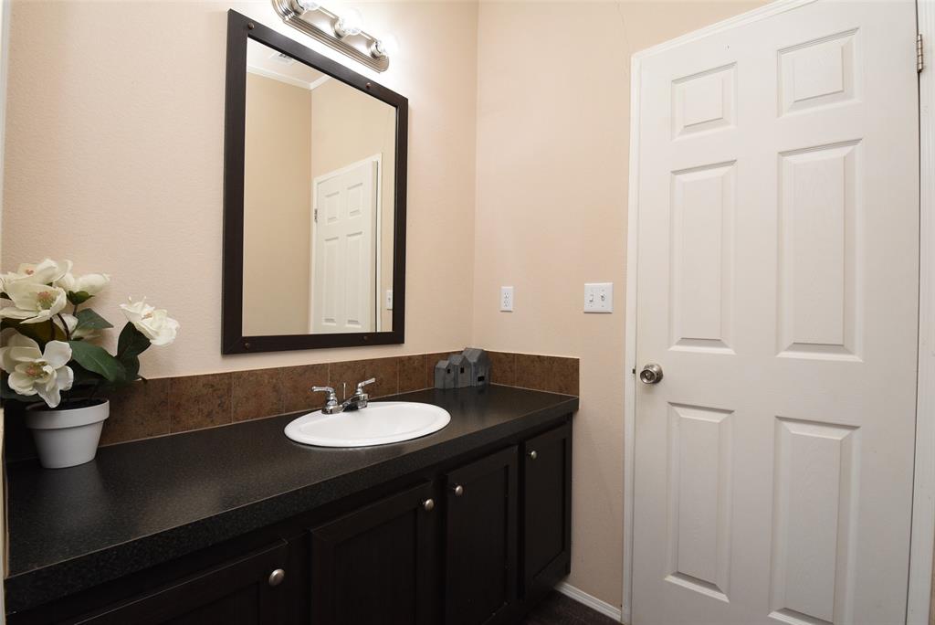 Large vanity in the secondary bathroom.