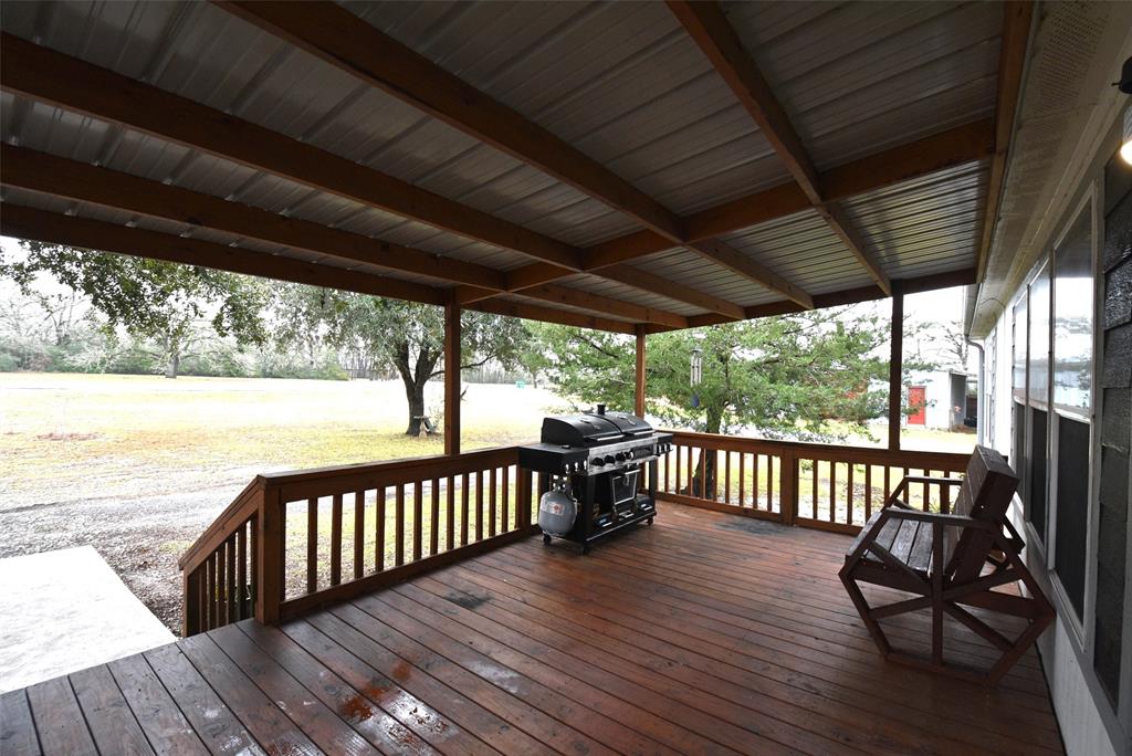 Another view of the large covered porch. Plenty of room for sitting area and entertaining.