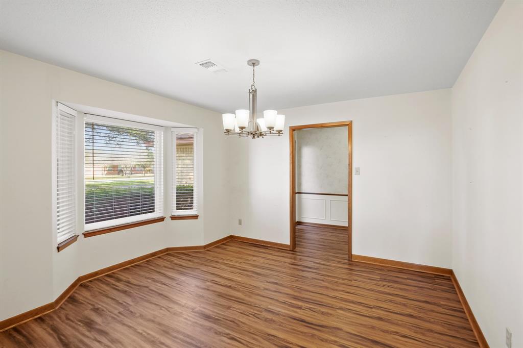 Formal dining. this room can easily be converted to a fourth bedroom or office.