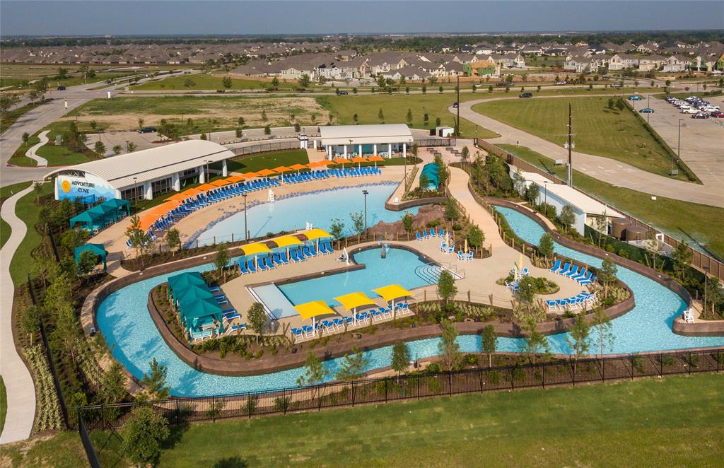 Enjoy the day at Adventure Cove with a lazy river, large pool and beach front play areas.