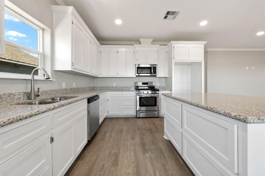 Never lived in New Construction! You\'d be the first to prepare a meal in this stunning kitchen designed with the chef in mind.