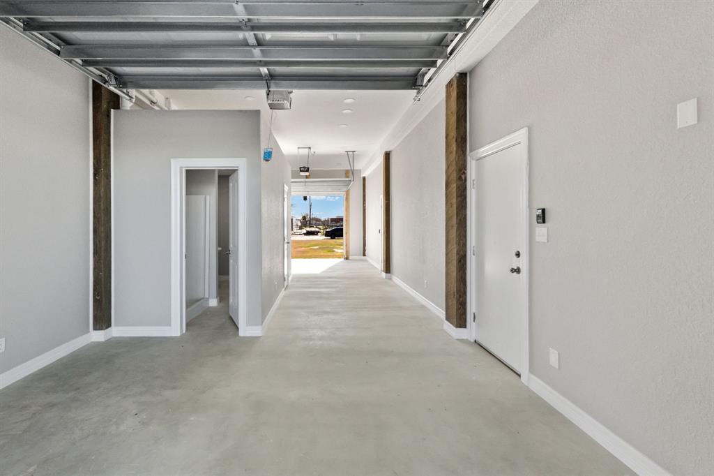 Multiple access points with the two garage doors w/ openers + two separate walk-through access doors to the full kitchen & to the flex space adjacent to the full bathroom.