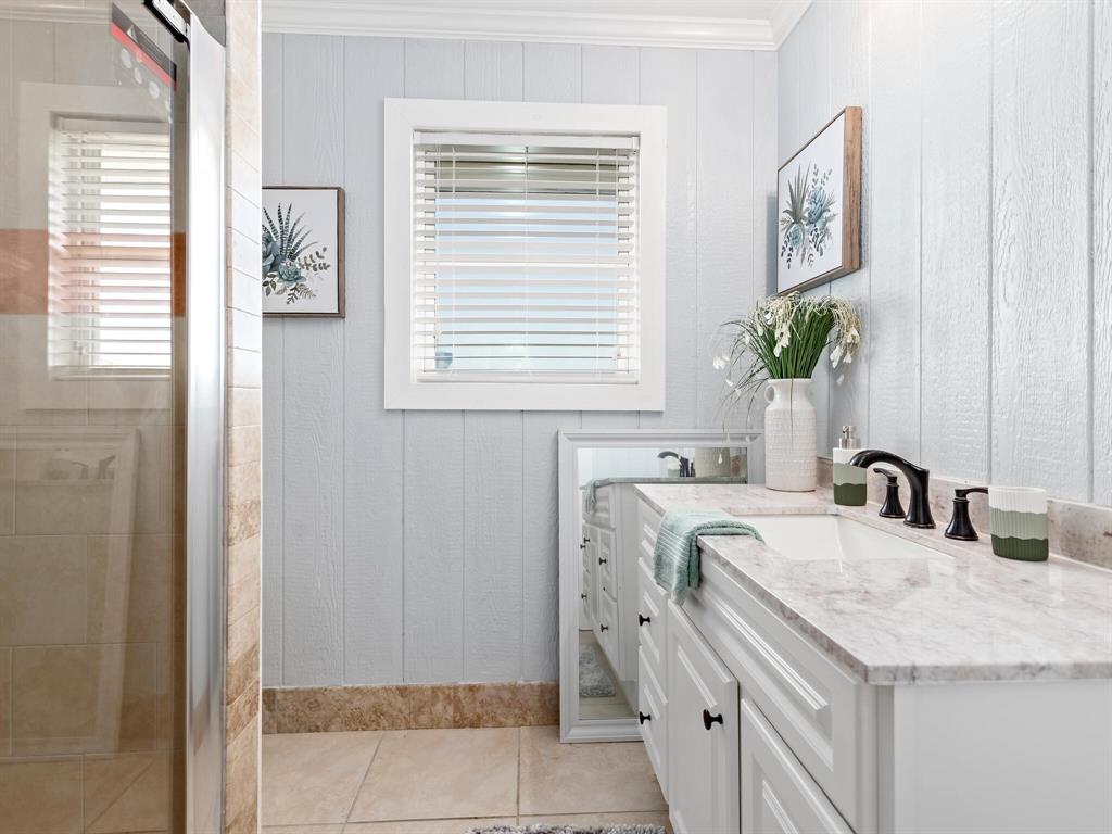 The second full bathroom with walk in shower.