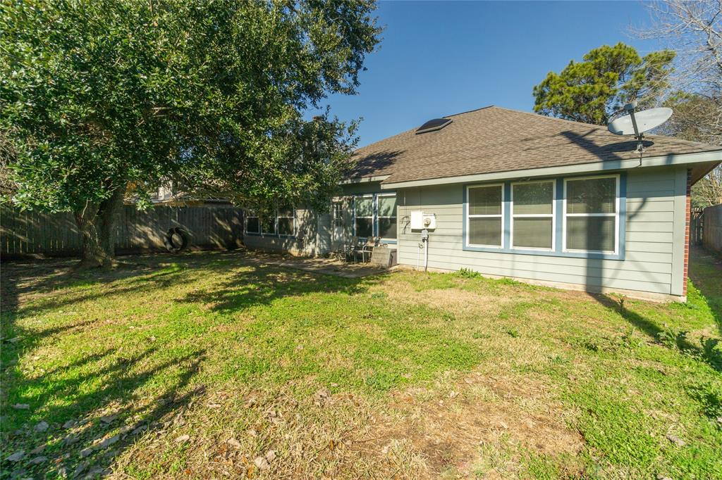 Spacious back yard with patio.