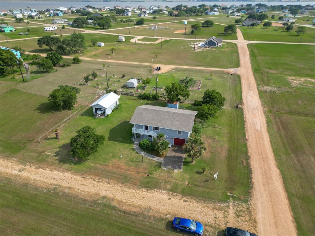 Aerial view of the entire property and lot