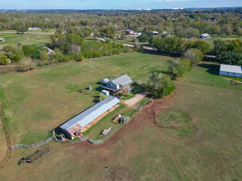 Mature trees stand sentinel around the property, providing shade and privacy while adding a touch of natural elegance. The land itself is a blank canvas, ready to be transformed into your own personal oasis.