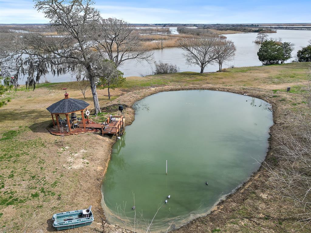 Aerial of stocked pond with aerator