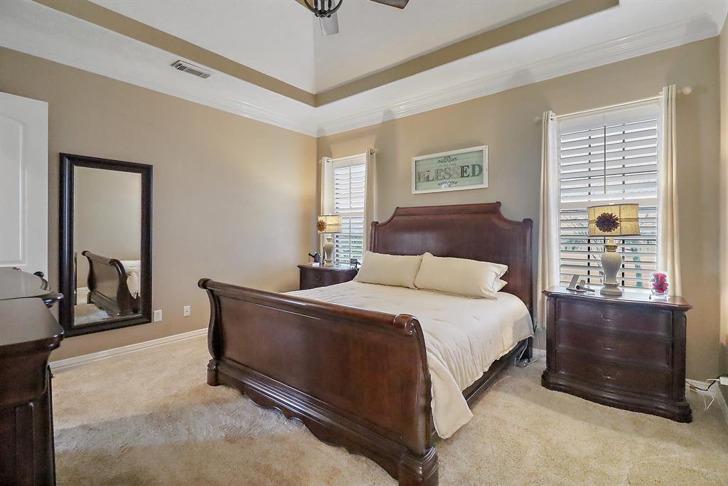 Primary Bedroom with stepped ceiling