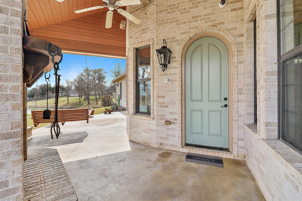 Arched back door with gas lantern light