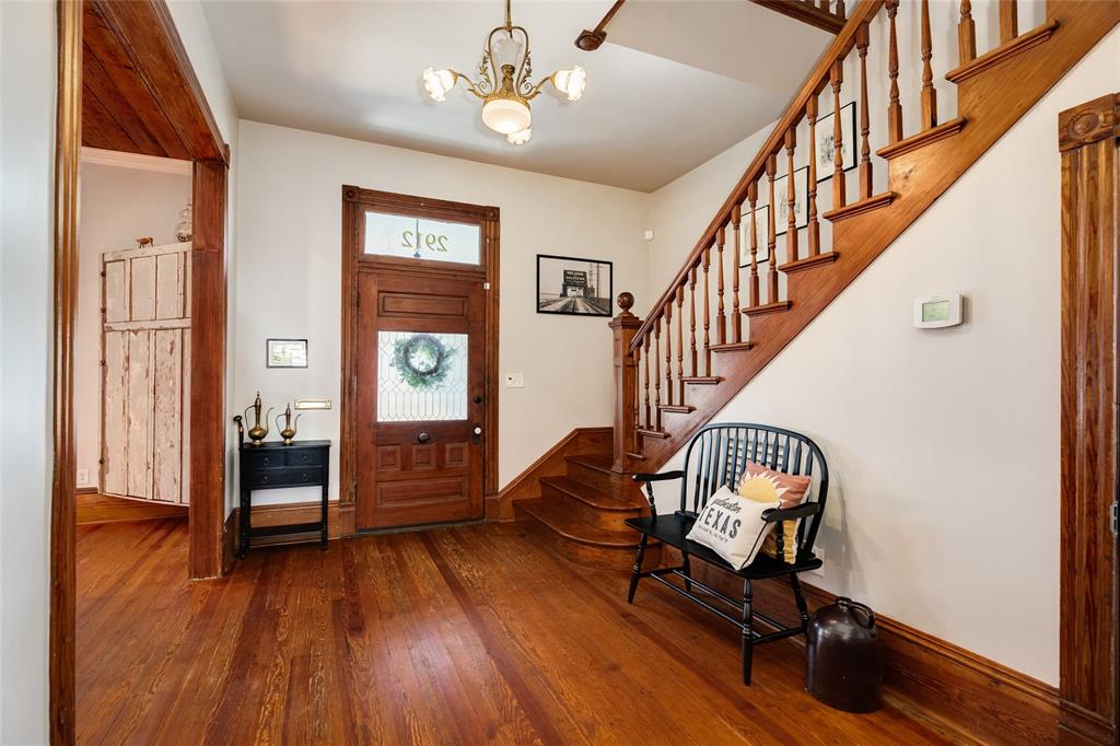 As you enter this gorgeous home, you\'re greeted with warm, original hard wood floors, vintage fixtures, and soaring ceilings.