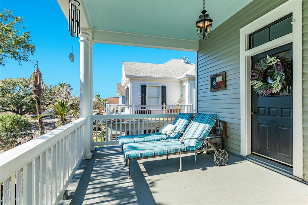 This view shows the upper gallery porch just outside the door in the bonus space outside the bedrooms at the top of the stair case.