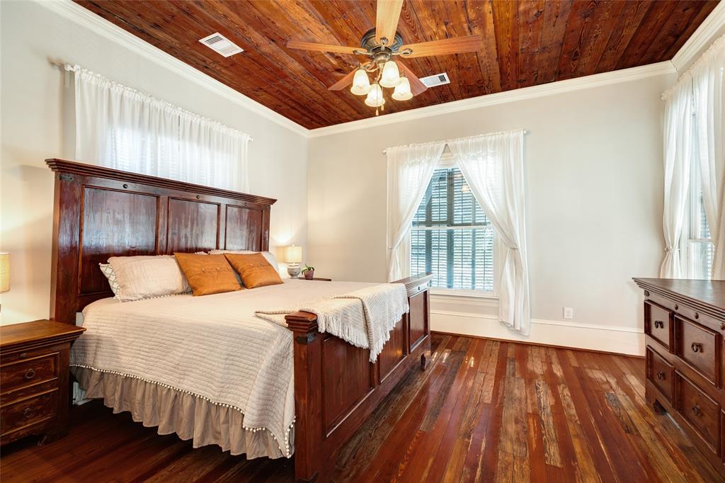 Bedroom two is large enough for king sized furniture and enjoys large windows with plenty of natural light, original hardwood floors and ceilings.