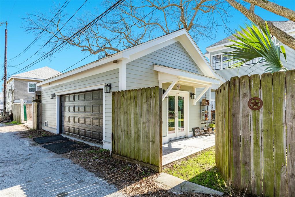 Notice the recently constructed garage has alley access, room for two cars, is oversized for storage or a workshop and is plumbed.