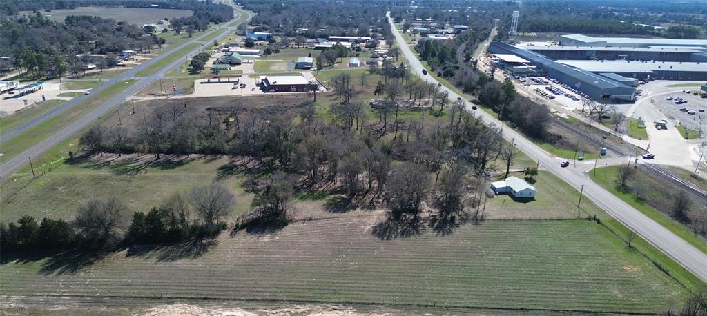 GREAT LOCATION! This beautiful property would be a great location for that new home or business. Located in Grapeland, stretching from Business 287 to the Highway 19/287 Bypass. Water and electricity are available along the highway. This property is fenced and cross fenced with some older sheds and pens, that could be used for a small operation or ag projects. There is some open land and ample shade trees on the property. Please give us a call to schedule a showing.