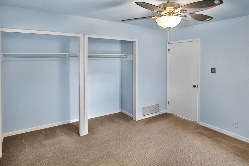 Secondary bedroom upstairs, closet area.