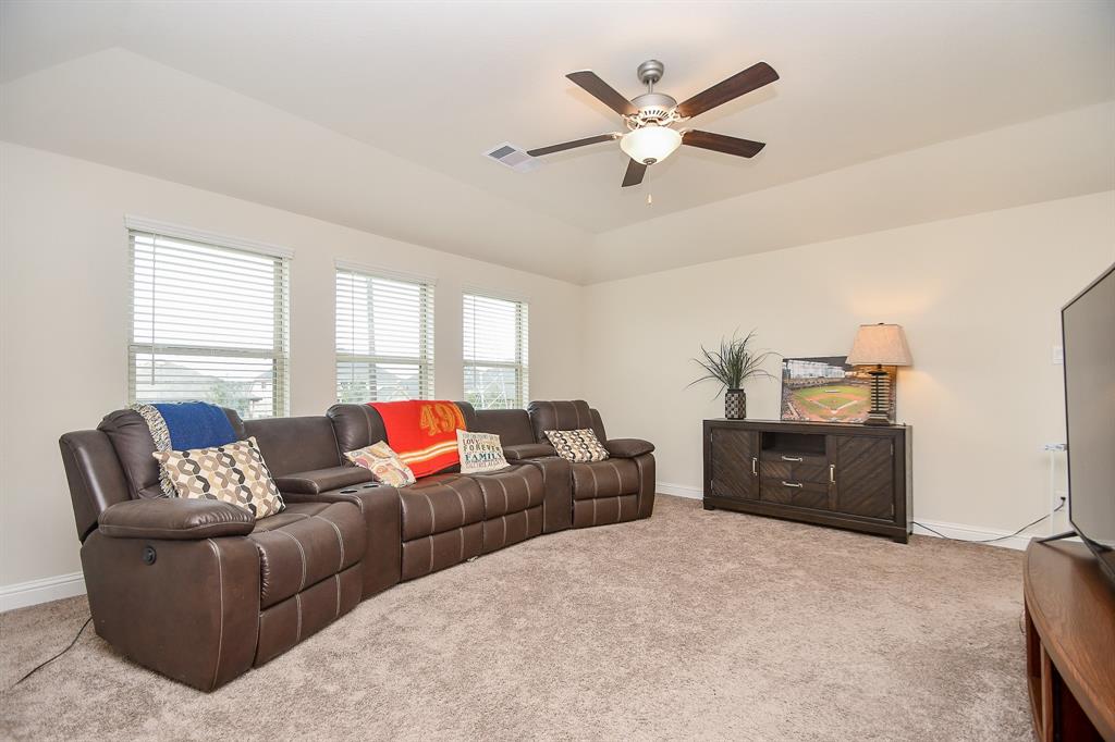 The upstairs game room area offers a wonderful space for gathering with family and friends.