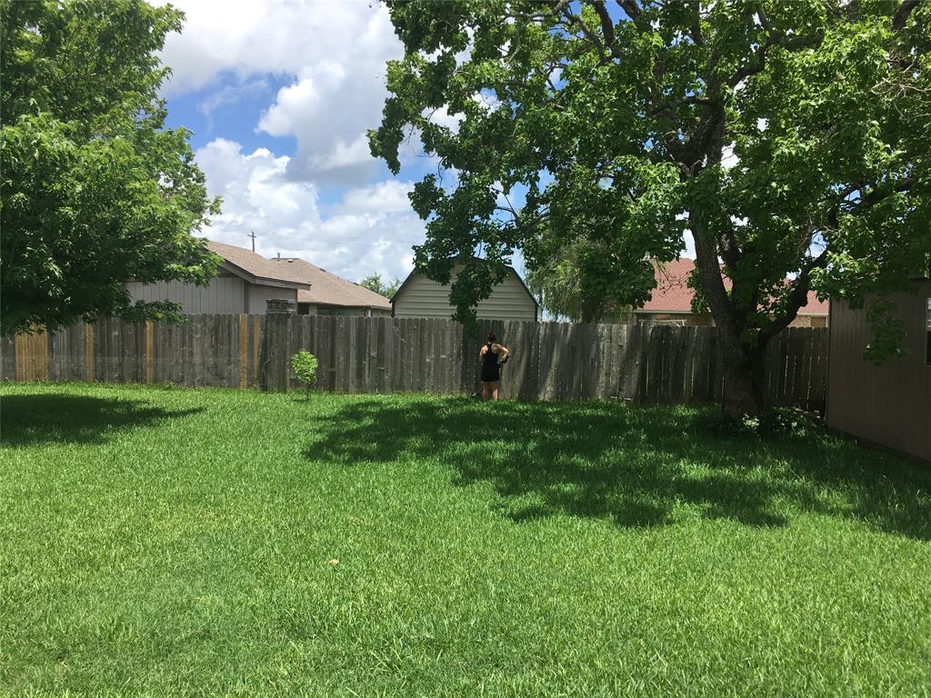 Large backyard w/grass