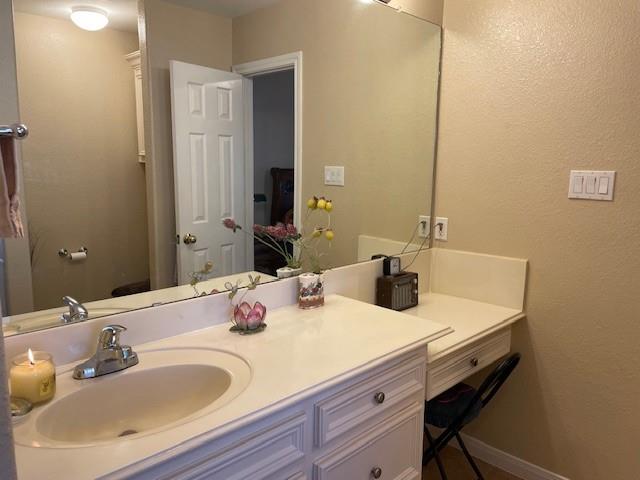 Master bath with vanity area, custom cabinets