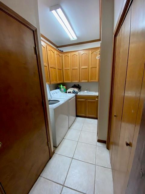 Laundry area with ample storage and half bath