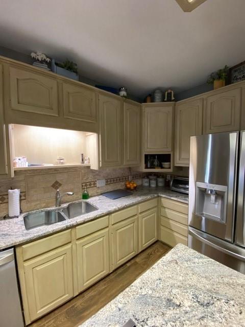 Kitchen prep are with dishwasher and plenty of cabinet storage