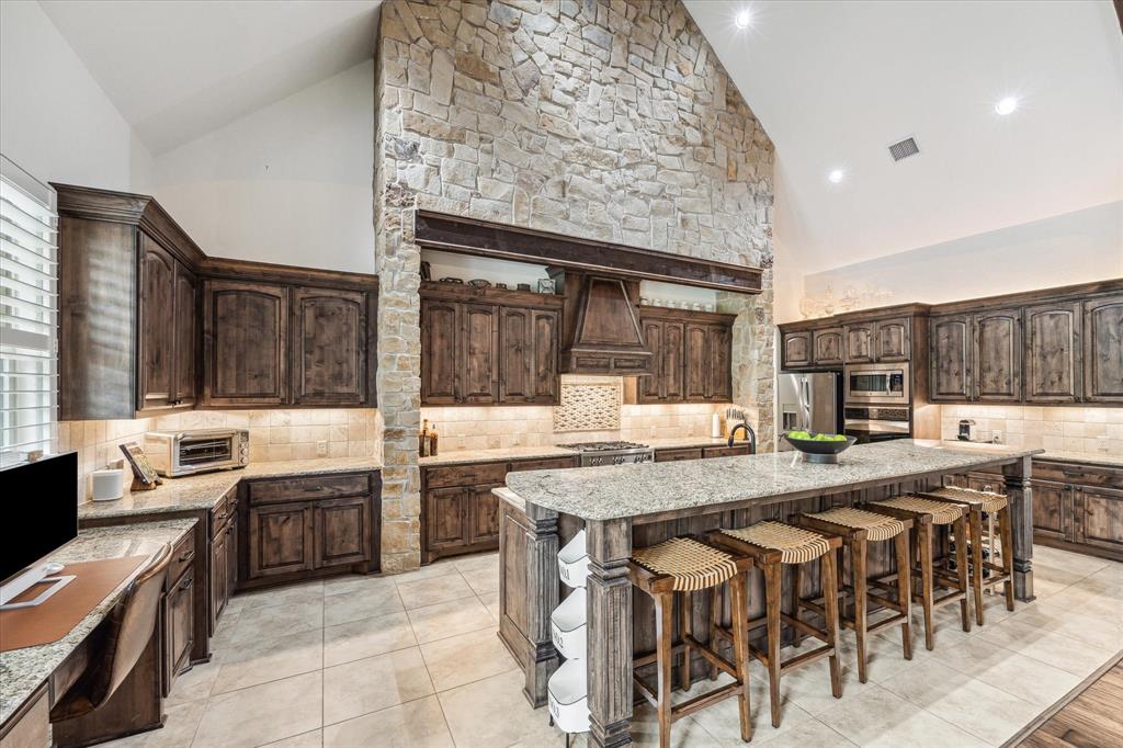 The kitchen has abundant upper and lower cabinet space