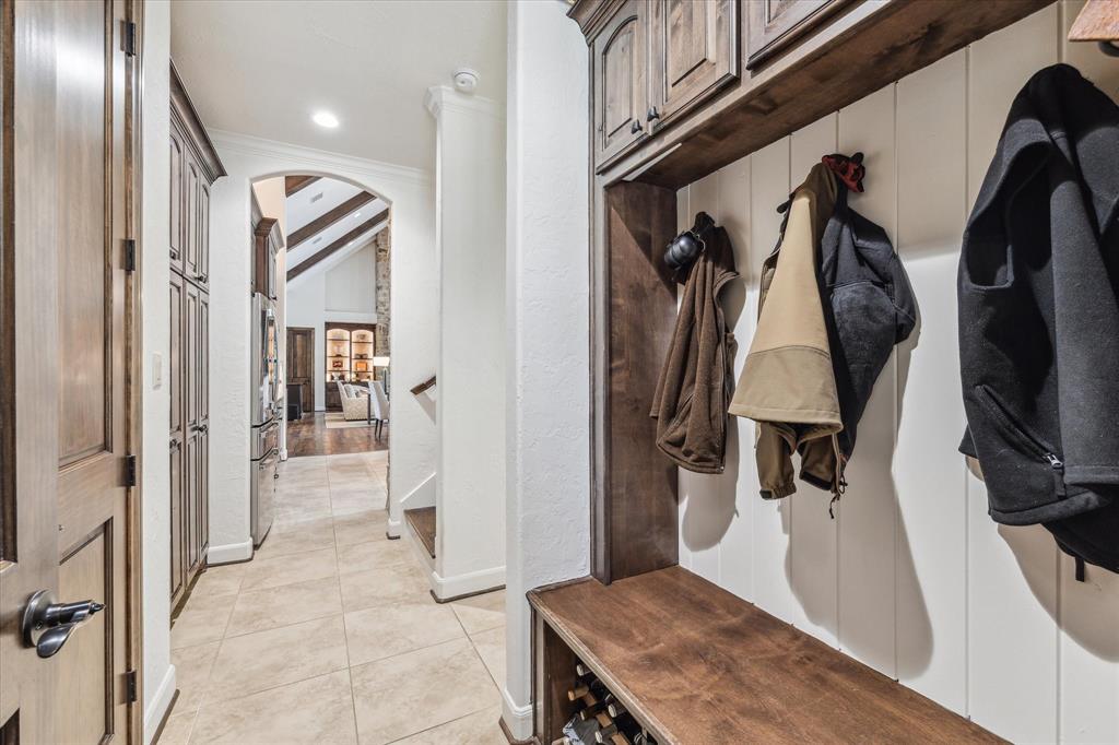 First floor mud room is close to the kitchen, powder room and utility room