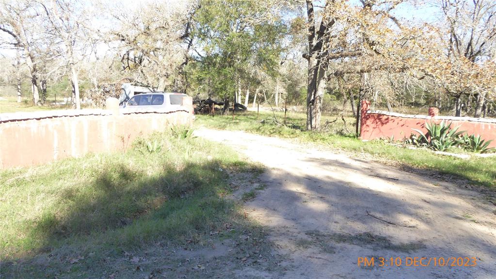20+ Unrestricted Acres on private road.  Secluded but still within minutes from Madisonville and I-45.  Great property for cattle or horse ranch.  About 70% is cleared & 30% wooded.  Recent paint, laminate floors & kitchen cabinets.