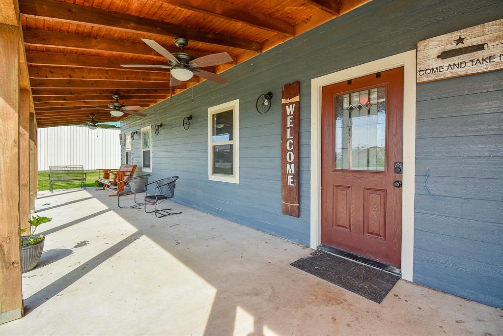 Enjoy generous relaxing outdoor space on your covered front porch.