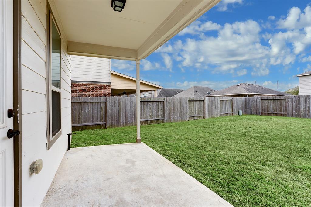 large fenced in back yard