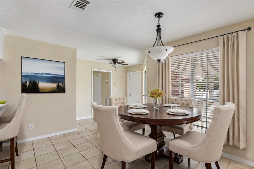 view of kitchen and living room from the breakfast area.