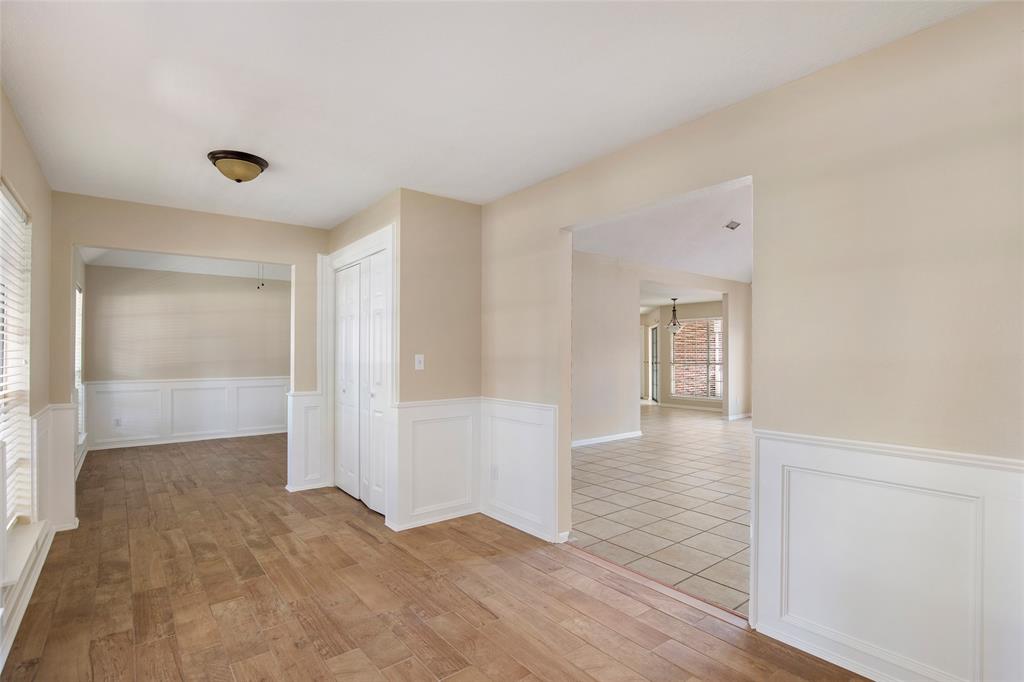 Front Entry looking into the living room to the right and the dining room to the left.