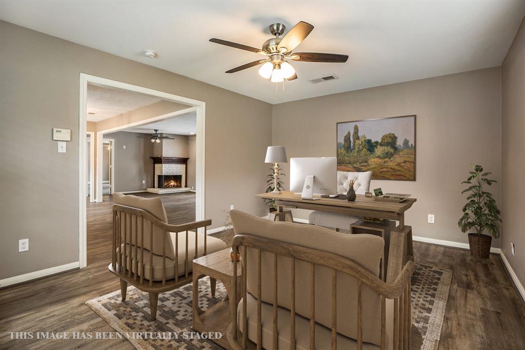 Dining area alongside the kitchen with a bar for additional countertop space and conversation.