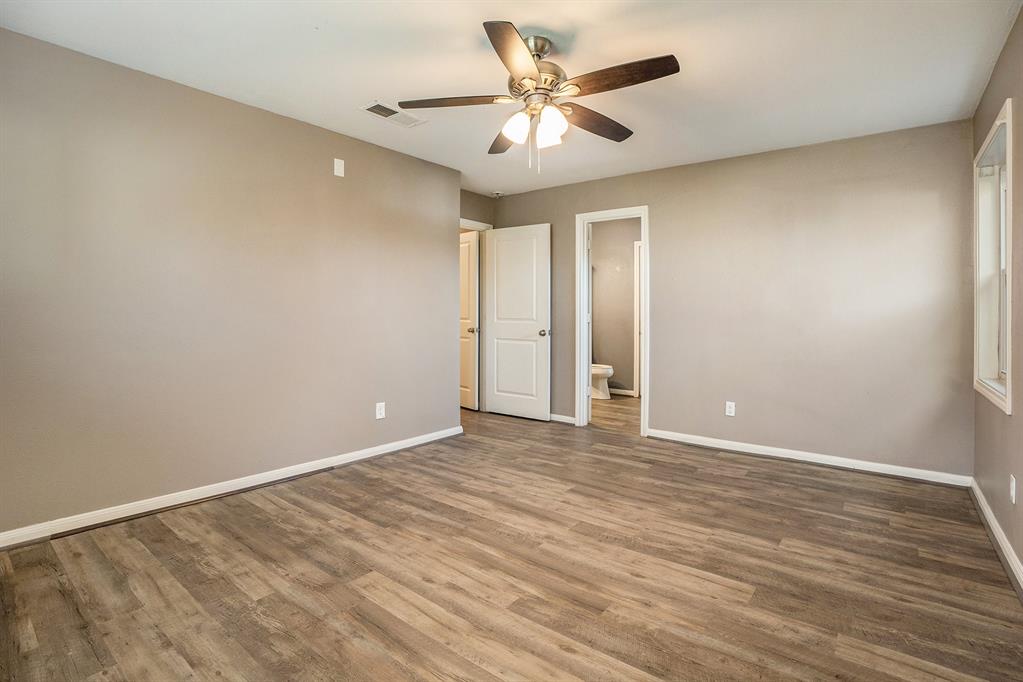 The kitchen has a stainless steel fridge included.