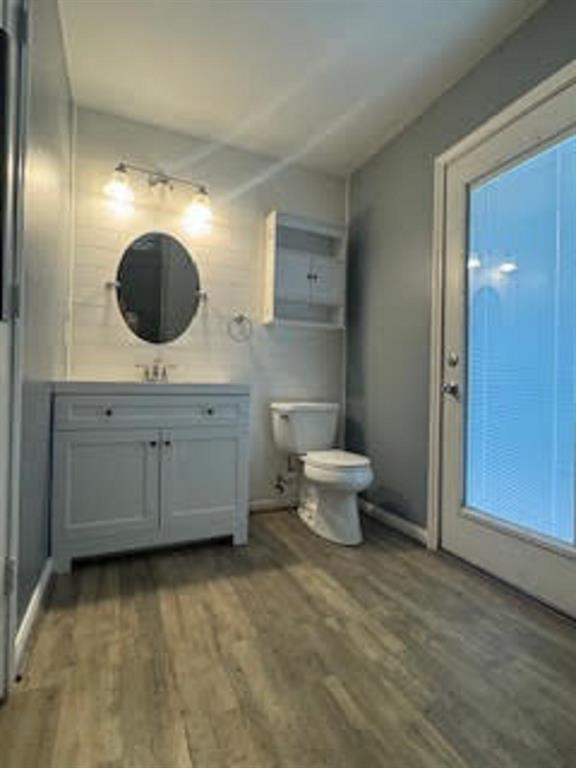 Glass door to oversized primary shower.