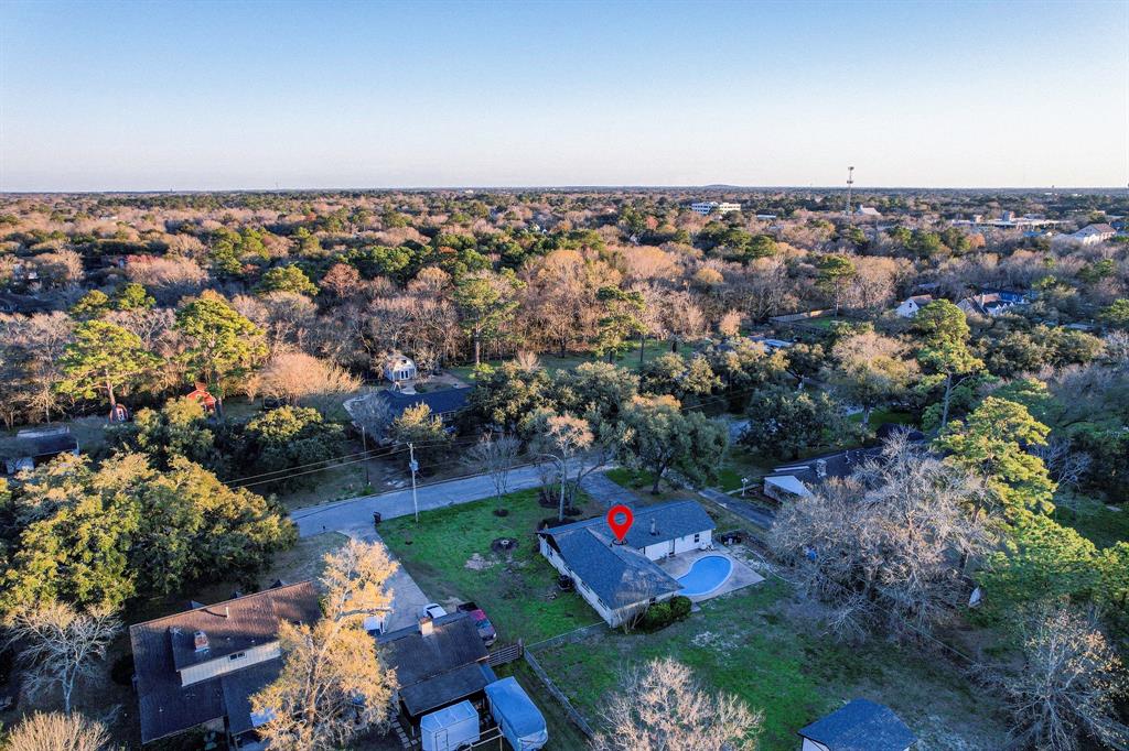 A double gate entry on the left makes it simple to access the expansive backyard.