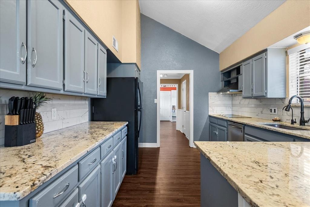 Beautiful quartz countertops  and plenty of cabinet space is sure to please the family chef.                         Home is equipped with a water softener system.