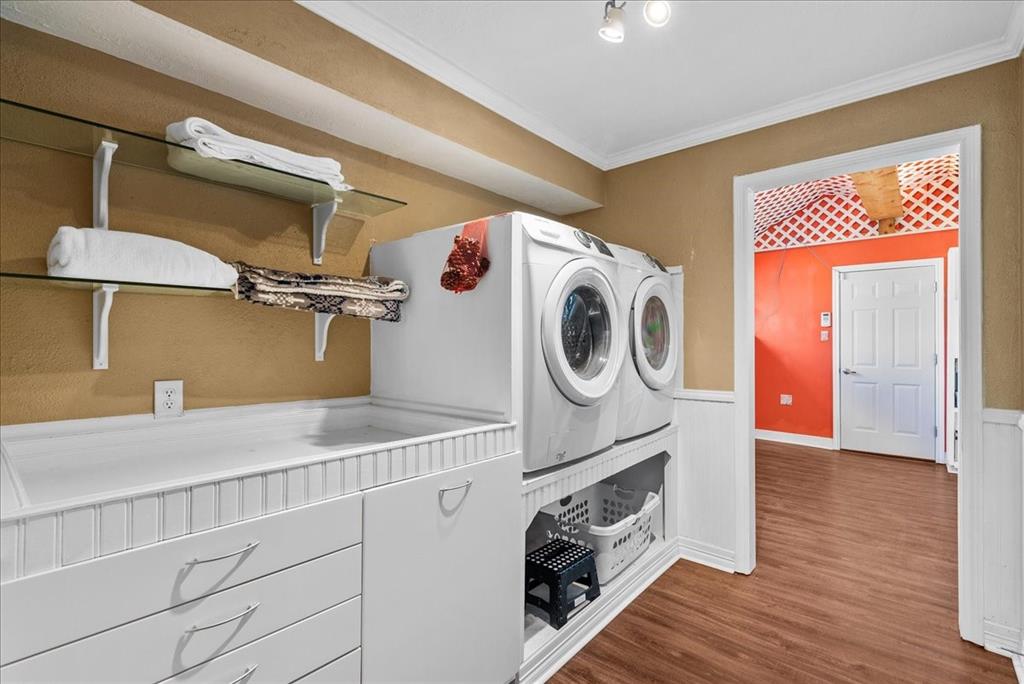 The laundry room is a spacious haven, with abundant storage options catering to every organizational need. From shelves to built-in cabinets and drawers, there\'s ample space to stow away detergents, cleaning supplies, and linens making it a functional and efficient space for tackling laundry tasks.