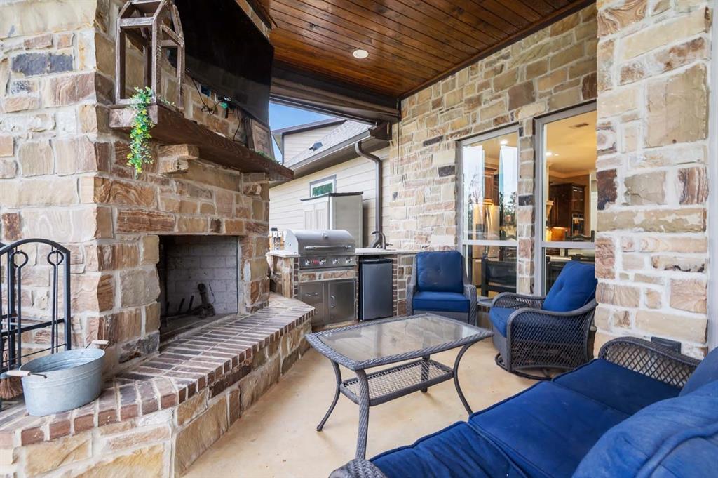 Outdoor Fireplace and Kitchen