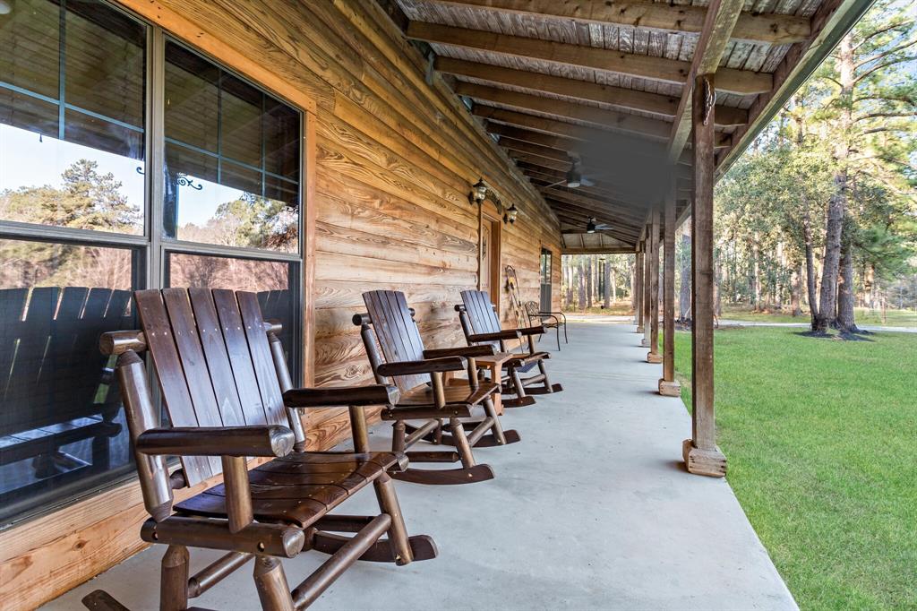 the porch wraps all the way around the home, concrete was recently freshly surfaced!