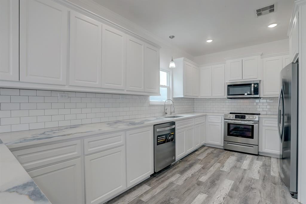 Stainless appliances  this is a picture of an existing home like the one being built