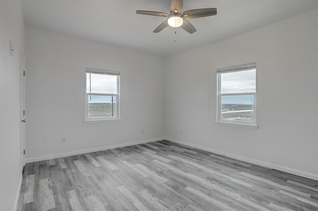 The third upstairs bedroom is large and adjacent to the hall bath v