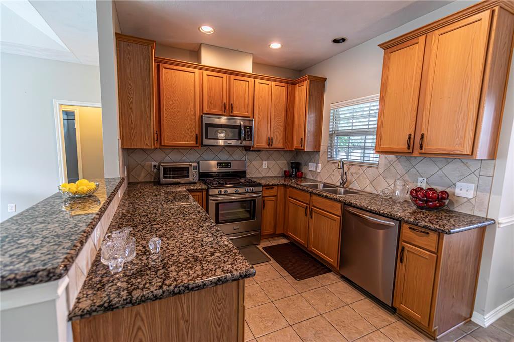 The dining room is right off the kitchen and open to the living room.